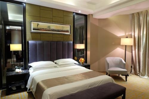 Imagen de la habitación del Hotel Vienna Dongguan Gaobu. Foto 8