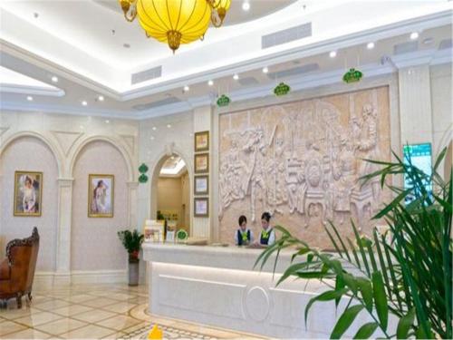 Imagen de la habitación del Hotel Vienna Dongguan Shatian Humen Port. Foto 9