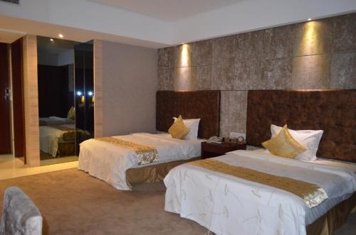 Imagen de la habitación del Hotel Vienna Dongguan Tangxia Guanlan Lake Golf Cl. Foto 6