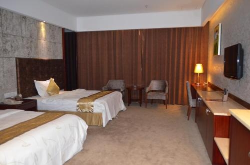 Imagen de la habitación del Hotel Vienna Dongguan Tangxia Guanlan Lake Golf Cl. Foto 8