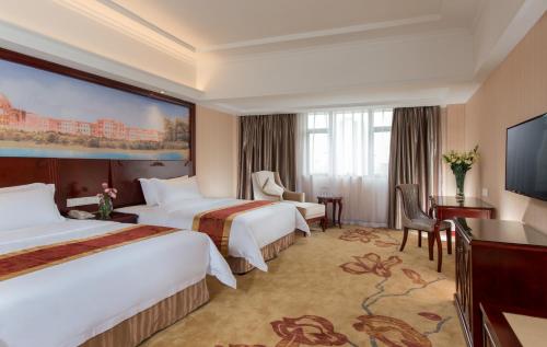Imagen de la habitación del Hotel Vienna Foshan Nanhai City Square. Foto 5