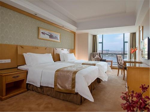 Imagen de la habitación del Hotel Vienna Guangzhou Panyu Dashi Qiao. Foto 7