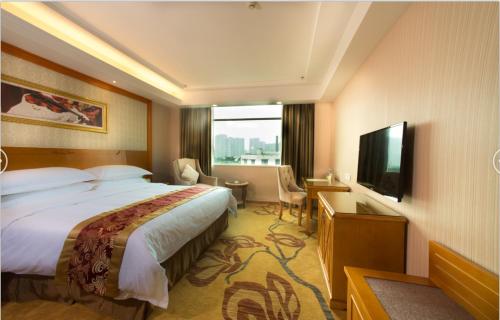 Imagen de la habitación del Hotel Vienna Guangzhou Songnan. Foto 6