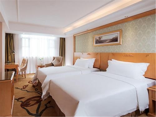 Imagen de la habitación del Hotel Vienna Guangzhou Tianhe Bus Station. Foto 6