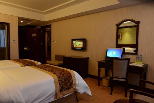 Imagen de la habitación del Hotel Vienna Guiyang Exhibition Center. Foto 9