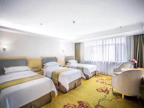 Imagen de la habitación del Hotel Vienna Harbin Train Station Jianguo Street. Foto 9