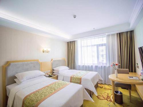 Imagen de la habitación del Hotel Vienna Harbin Train Station Jianguo Street. Foto 10
