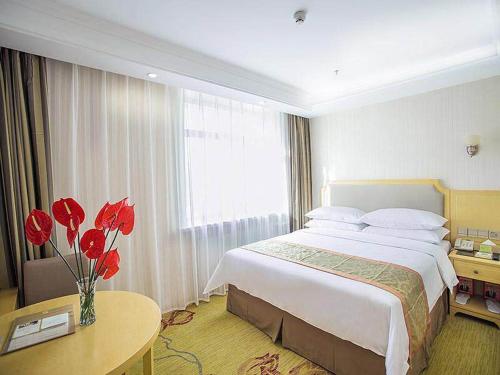 Imagen de la habitación del Hotel Vienna Harbin Train Station Jianguo Street. Foto 12