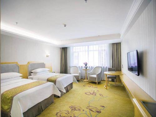 Imagen de la habitación del Hotel Vienna Harbin Train Station Jianguo Street. Foto 13