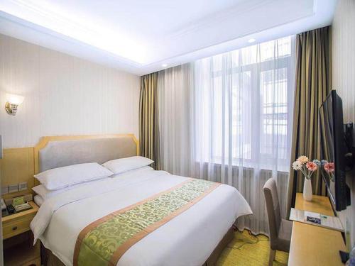 Imagen de la habitación del Hotel Vienna Harbin Train Station Jianguo Street. Foto 15