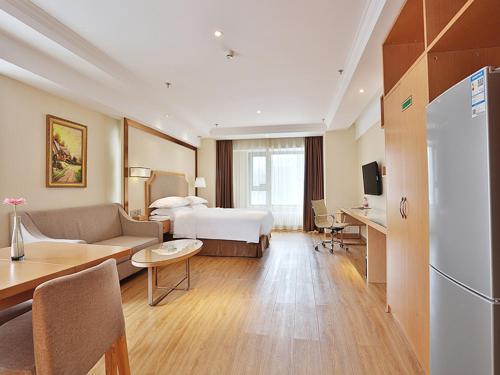Imagen de la habitación del Hotel Vienna Harbin West Railway Station Wanda Plaza. Foto 11
