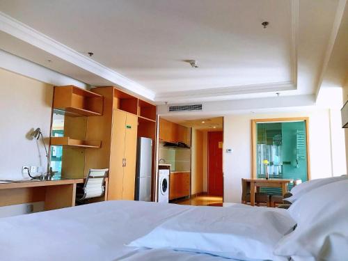 Imagen de la habitación del Hotel Vienna Harbin West Railway Station Wanda Plaza. Foto 12