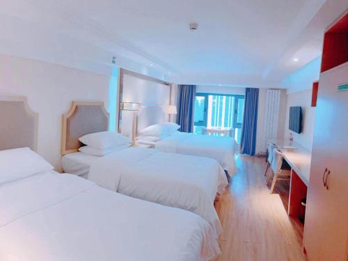Imagen de la habitación del Hotel Vienna Harbin West Railway Station Wanda Plaza. Foto 14