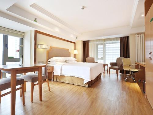 Imagen de la habitación del Hotel Vienna Harbin West Railway Station Wanda Plaza. Foto 15