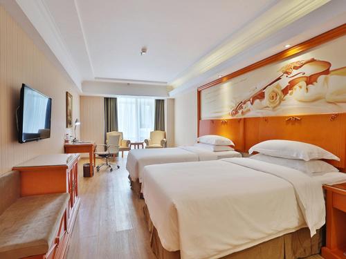 Imagen de la habitación del Hotel Vienna Harbin West Railway Station Wanda Plaza. Foto 17