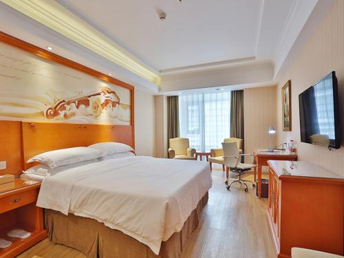 Imagen de la habitación del Hotel Vienna Harbin West Railway Station Wanda Plaza. Foto 18