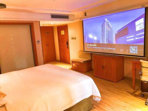 Imagen de la habitación del Hotel Vienna Harbin West Railway Station Wanda Plaza. Foto 19