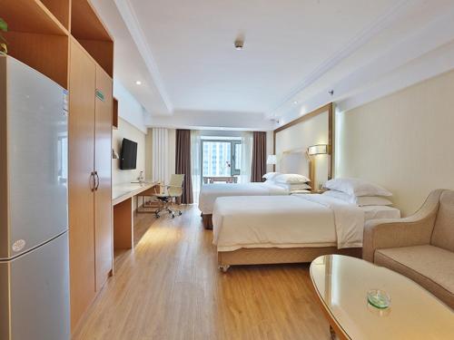 Imagen de la habitación del Hotel Vienna Harbin West Railway Station Wanda Plaza. Foto 20