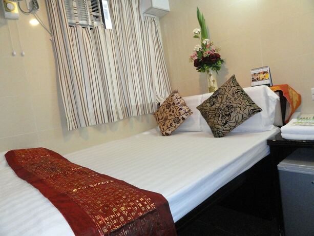 Imagen de la habitación del Hotel Vienna Hostel, Kowloon. Foto 5