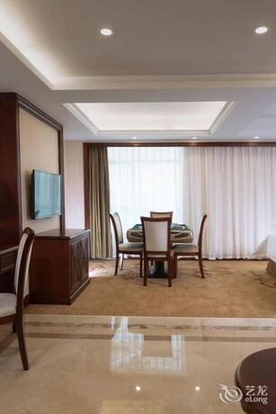 Imagen de la habitación del Hotel Vienna Hotel. Foto 10