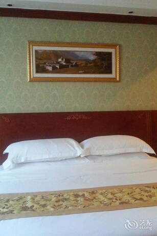Imagen de la habitación del Hotel Vienna Hotel. Foto 13