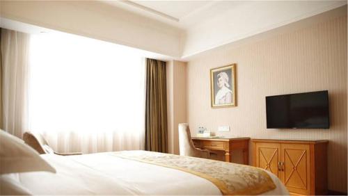 Imagen de la habitación del Hotel Vienna Hotel (Foshan Lingnan Mingzhu Stadium). Foto 5