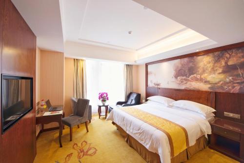 Imagen de la habitación del Hotel Vienna Hotel Jinshan New City Wanda Plaza. Foto 4