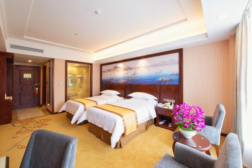 Imagen de la habitación del Hotel Vienna Hotel Jinshan New City Wanda Plaza. Foto 5