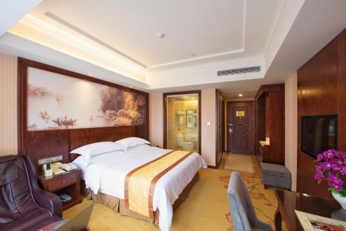 Imagen de la habitación del Hotel Vienna Hotel Jinshan New City Wanda Plaza. Foto 6