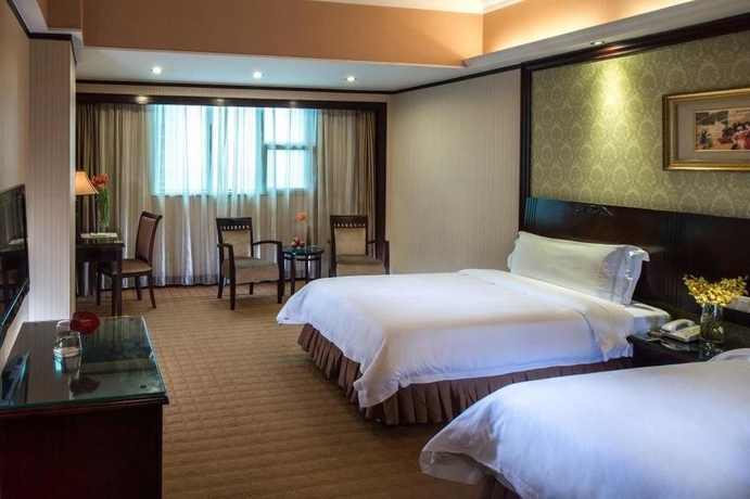 Imagen de la habitación del Hotel Vienna Hotel Shenzhen Fuhua Road. Foto 3
