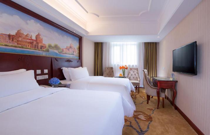Imagen de la habitación del Hotel Vienna Hotel (Shenzhen Shajing Shangnan Branch). Foto 7