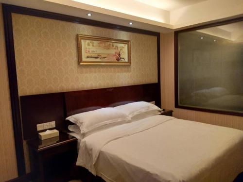 Imagen de la habitación del Hotel Vienna Hotel Shenzhen Shangjin Center. Foto 5