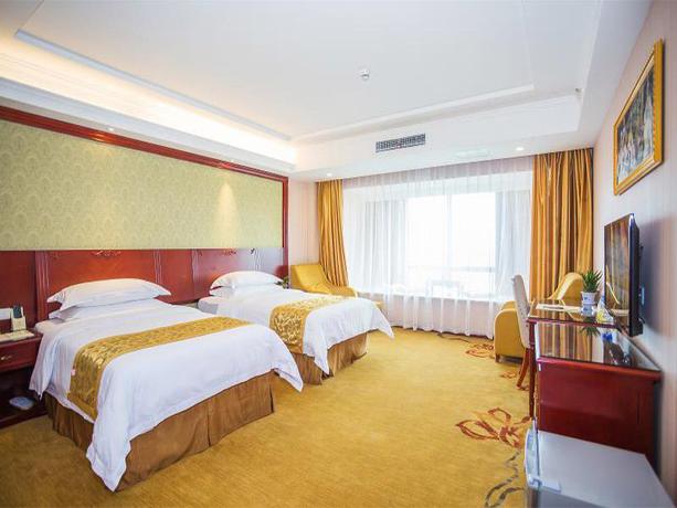 Imagen de la habitación del Hotel Vienna Hotel Suzhou Railway Station. Foto 1