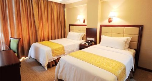 Imagen de la habitación del Hotel Vienna Hotel Yangzhou Wenchangge. Foto 9