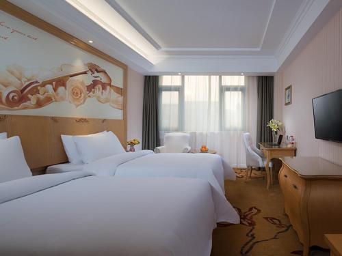 Imagen de la habitación del Hotel Vienna Huaidong Road Yuncheng. Foto 14