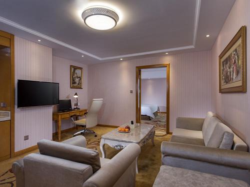 Imagen de la habitación del Hotel Vienna International ASEAN Avenue Dongxing. Foto 19