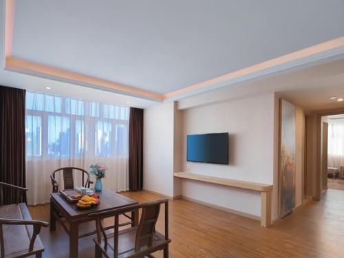 Imagen de la habitación del Hotel Vienna International FuJian PuTian Pearl. Foto 20