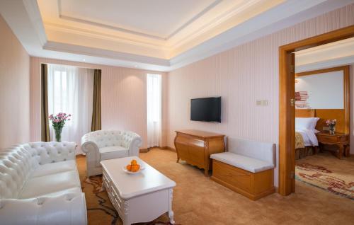 Imagen de la habitación del Hotel Vienna International Guangzhou Xintang Jean. Foto 3