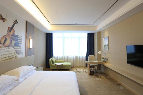 Imagen de la habitación del Hotel Vienna International Hengyang Huayao city. Foto 17