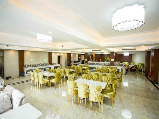 Imagen del bar/restaurante del Hotel Vienna International Hongqiao Hub Malu. Foto 13
