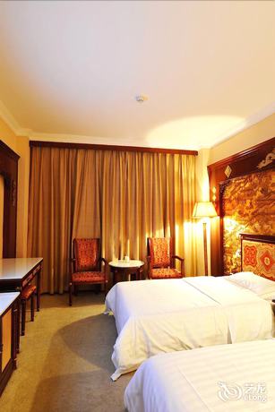 Imagen de la habitación del Hotel Vienna International Hotel Beihai Beibuwan Square Branch. Foto 9