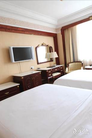 Imagen de la habitación del Hotel Vienna International Hotel Beihai Beibuwan Square Branch. Foto 14