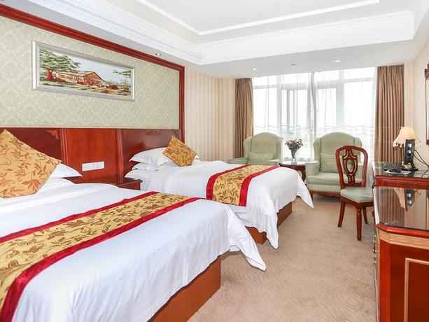 Imagen de la habitación del Hotel Vienna International Hotel Ningbo Jiangbei Wanda. Foto 14