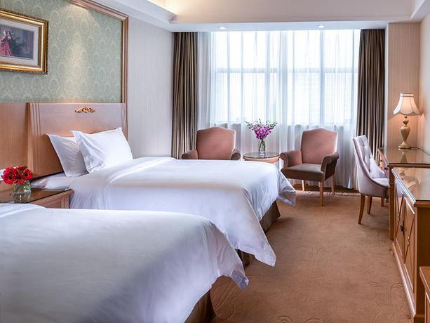 Imagen de la habitación del Hotel Vienna International Hotel (Shenzhen Wangzhong Cit. Foto 6