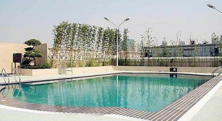 Imagen de la piscina del Hotel Vienna International Hotel Suzhou University Town. Foto 12