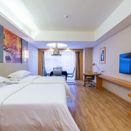 Imagen de la habitación del Hotel Vienna International Hotel Wuyi Square. Foto 4