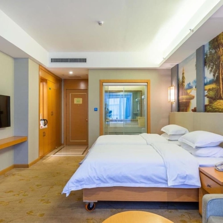 Imagen de la habitación del Hotel Vienna International Hotel Wuyi Square. Foto 7