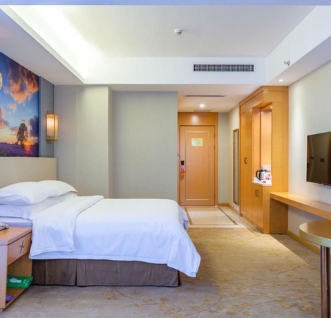 Imagen de la habitación del Hotel Vienna International Hotel Wuyi Square. Foto 9