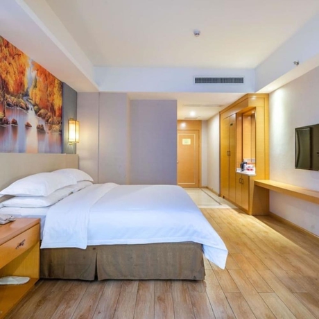 Imagen de la habitación del Hotel Vienna International Hotel Wuyi Square. Foto 13