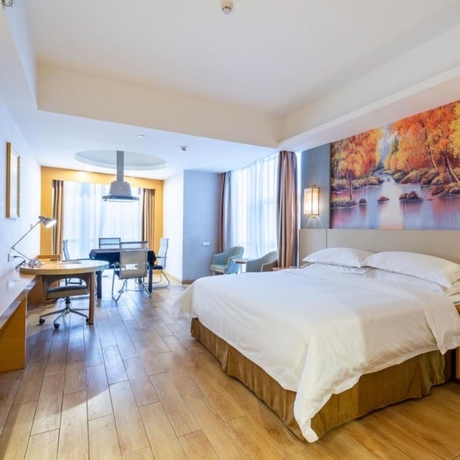 Imagen de la habitación del Hotel Vienna International Hotel Wuyi Square. Foto 16